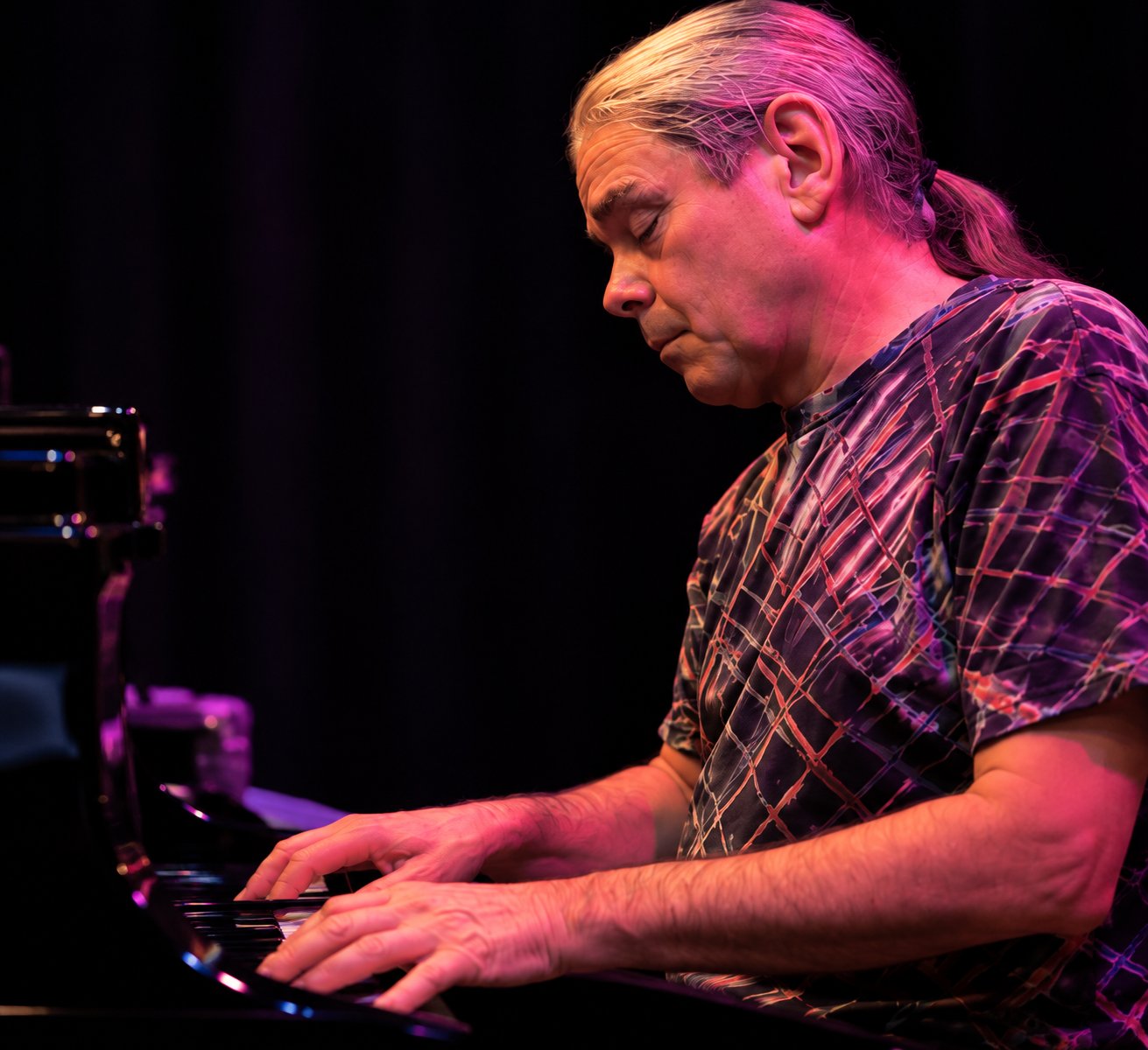 Matthew Cook performing at the piano
